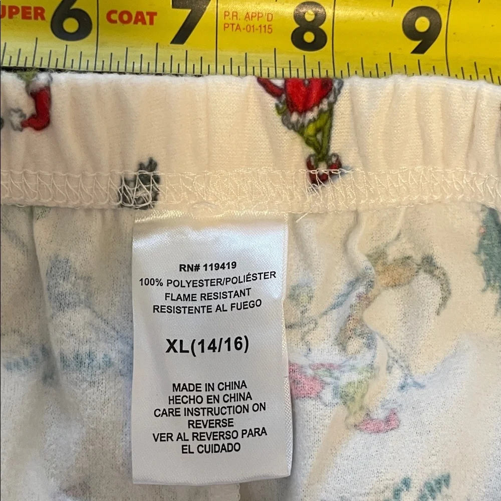 Festive Cream Pajama Set with Grinch print nwot